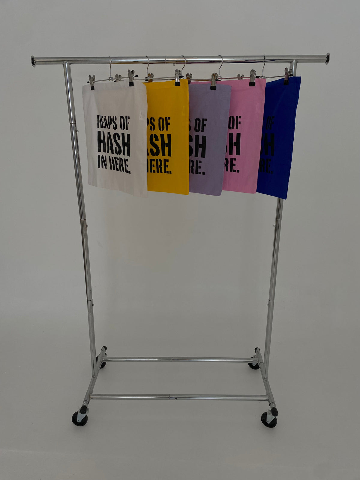 Tote bag range on rack — wider shot